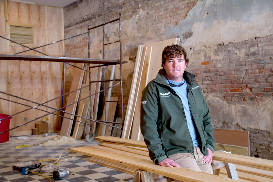 business owner in building under construction